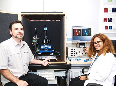 Dr Christophe Demaille and PhD student Cecilia Taofifenua in front of the JPK NanoWizard
