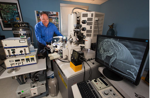 Gary Bauchan, Director, Electron & Confocal Microscopy Unit, USDA-ARS inserts mite specimens into the Quorum PP2000 Cryo-Prep Chamber