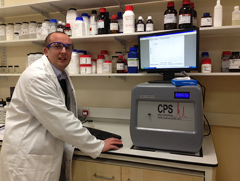 Luke Alger, Scott Bader’s polymer development manager, using the CPS Disc Centrifuge for measuring conventional and inverse emulsions